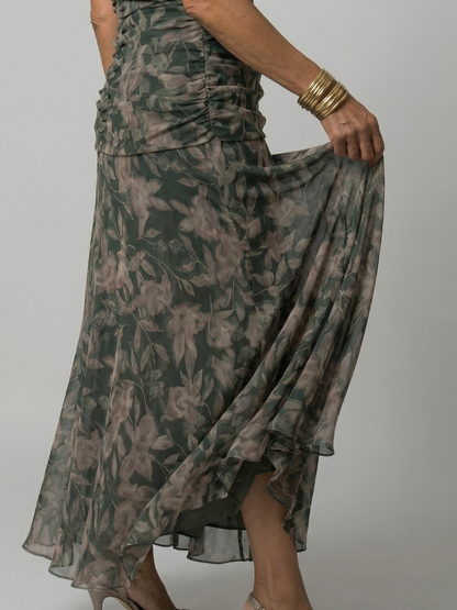 Off-shoulder flowy midi dress, close-up of the fabric