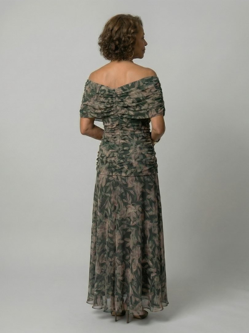 Off-shoulder flowy midi dress, close-up of the neckline