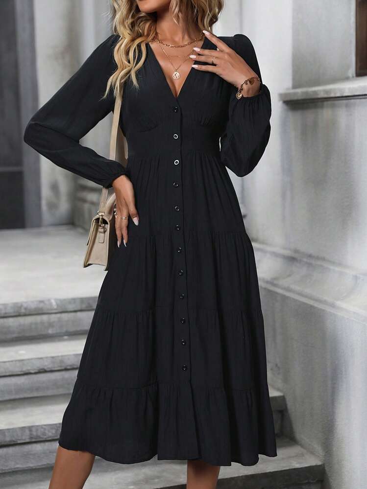 Long sleeve pleated midi dress, angled back view