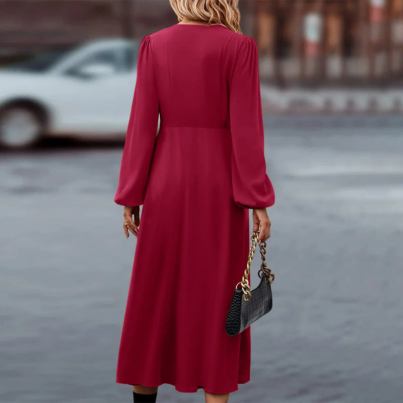 Long sleeve pleated midi dress, close-up of the neckline
