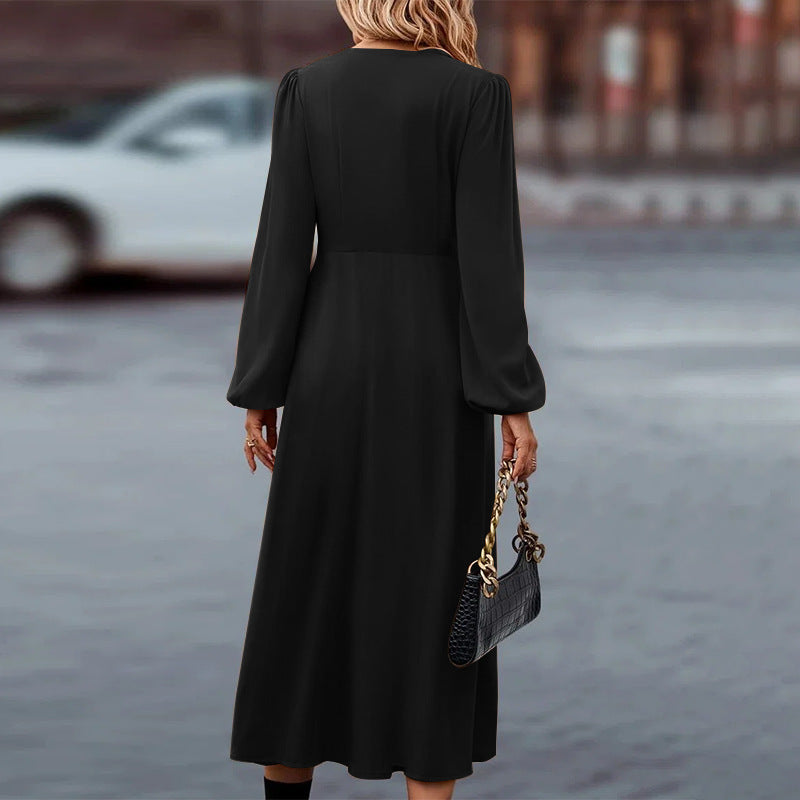 Long sleeve pleated midi dress, angled front view